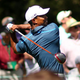 Tiger Woods playing during the Masters on April 13, 2013 (Mike Ehrmann/Getty)